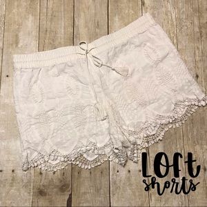 White crochet lace linen Loft shorts.